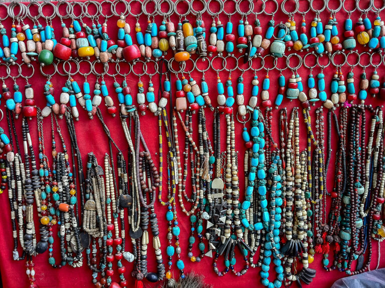 Top 15 Must-Buy Souvenirs in Nepal: Unique Gifts to Take Home, singing bowl, Nepal gift ideas, buy Nepali gifts, Nepal souvenir ideas, travel guide Nepal, Nepal travel tips, saru's postcards, handicrafts nepal, Nepali jewelry, turquoise jewelry Nepal