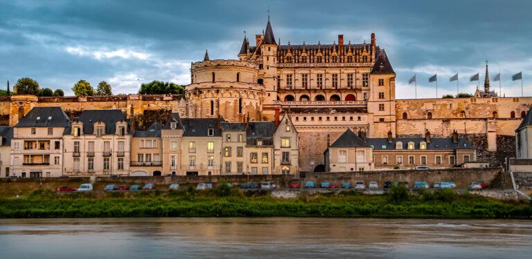 My Top 12 Castles in the Loire Valley, France, Château de Chambord aerial view with double-helix staircase and towers, Château de Chenonceau spanning the River Cher with arches and gardens, Château d’Amboise royal fortress with terrace and Saint-Hubert chapel, Château de Blois, Renaissance palace courtyard with ornate staircase, Château de Villandry with famous ornamental Renaissance gardens, Château d’Azay-le-Rideau reflected in the river on a small island, Château d’Ussé fairy-tale castle with turrets and Sleeping Beauty theme, Château de Chaumont-sur-Loire with Loire River view and festival gardens, Château de Brézé fortress with deep dry moat and underground tunnels, Château de Valençay Renaissance château with classical façade and gardens, Château de Chinon medieval fortress with towers and panoramic views, Château de Loches medieval keep with stone walls and royal apartments