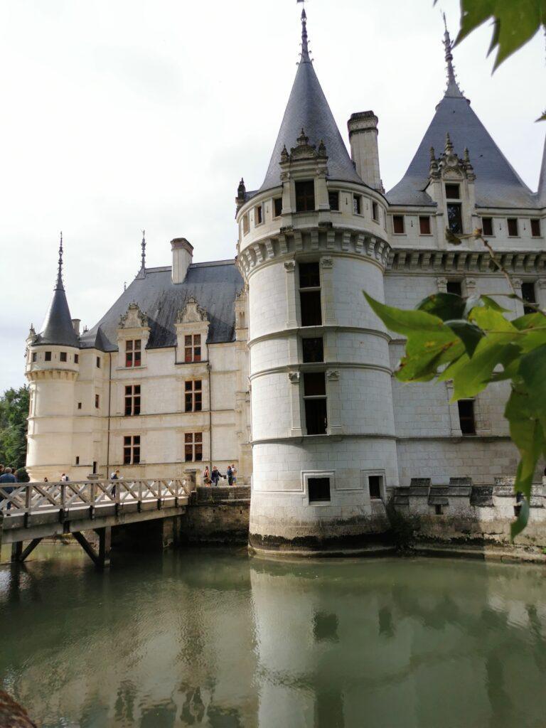My Top 12 Castles in the Loire Valley, France, Château de Chambord aerial view with double-helix staircase and towers, Château de Chenonceau spanning the River Cher with arches and gardens, Château d’Amboise royal fortress with terrace and Saint-Hubert chapel, Château de Blois, Renaissance palace courtyard with ornate staircase, Château de Villandry with famous ornamental Renaissance gardens, Château d’Azay-le-Rideau reflected in the river on a small island, Château d’Ussé fairy-tale castle with turrets and Sleeping Beauty theme, Château de Chaumont-sur-Loire with Loire River view and festival gardens, Château de Brézé fortress with deep dry moat and underground tunnels, Château de Valençay Renaissance château with classical façade and gardens, Château de Chinon medieval fortress with towers and panoramic views, Château de Loches medieval keep with stone walls and royal apartments