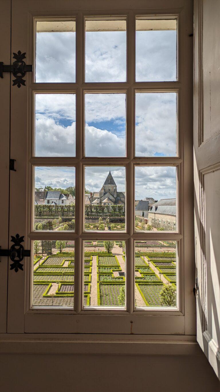 Villandry Castle Loire Valley aerial view with gardens, Renaissance ornamental gardens at Château de Villandry geometric patterns, Villandry water garden with fountains and reflective pools, Château de Villandry vegetable garden colorful seasonal plants, Villandry castle façade with Renaissance architecture, Château de Villandry terrace view overlooking formal gardens, Villandry herb garden with neatly arranged sections, Sunset at Villandry Castle golden light on the gardens, Visitors walking through Villandry Castle grounds, Château de Villandry in spring tulips and vibrant flowers, A Day at Villandry Castle: Where Gardens Steal the Show