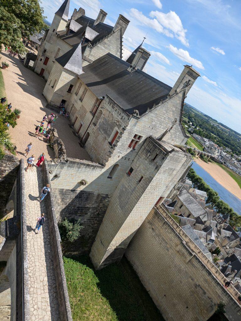 My Top 12 Castles in the Loire Valley, France, Château de Chambord aerial view with double-helix staircase and towers, Château de Chenonceau spanning the River Cher with arches and gardens, Château d’Amboise royal fortress with terrace and Saint-Hubert chapel, Château de Blois, Renaissance palace courtyard with ornate staircase, Château de Villandry with famous ornamental Renaissance gardens, Château d’Azay-le-Rideau reflected in the river on a small island, Château d’Ussé fairy-tale castle with turrets and Sleeping Beauty theme, Château de Chaumont-sur-Loire with Loire River view and festival gardens, Château de Brézé fortress with deep dry moat and underground tunnels, Château de Valençay Renaissance château with classical façade and gardens, Château de Chinon medieval fortress with towers and panoramic views, Château de Loches medieval keep with stone walls and royal apartments