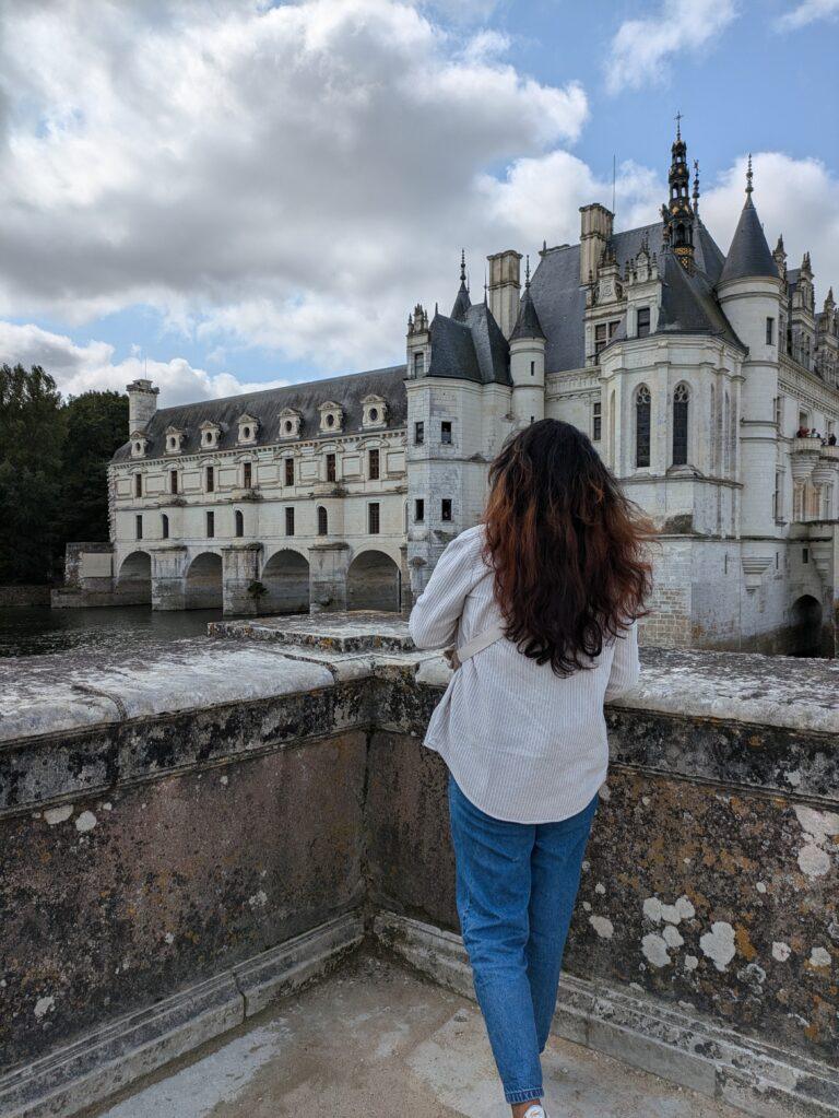 Château de Chenonceau on the River Cher Loire Valley iconic castle reflection, Aerial view of Chenonceau Castle stretching across the river Renaissance architecture, Interior of Château de Chenonceau grand gallery with arched windows, The Apothecary of Chenonceau Castle historic cabinets and jars, Chenonceau gardens in spring colorful flowers and symmetrical design, A Day at Chenonceau Castle: The Jewel of the Loire Valley, Castle façade of Chenonceau at sunrise soft golden light over the river, Château de Chenonceau during autumn warm colors surrounding the castle, Historic kitchen of Chenonceau Castle copper pots and stone arches, Visitors walking across the gallery bridge at Château de Chenonceau, Night view of Chenonceau Castle illuminated reflections on the Cher River