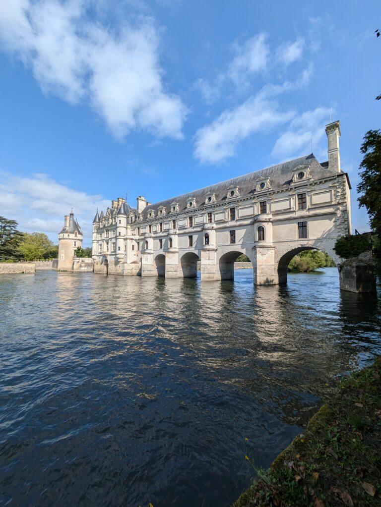 My Top 12 Castles in the Loire Valley, France, Château de Chambord aerial view with double-helix staircase and towers, Château de Chenonceau spanning the River Cher with arches and gardens, Château d’Amboise royal fortress with terrace and Saint-Hubert chapel, Château de Blois, Renaissance palace courtyard with ornate staircase, Château de Villandry with famous ornamental Renaissance gardens, Château d’Azay-le-Rideau reflected in the river on a small island, Château d’Ussé fairy-tale castle with turrets and Sleeping Beauty theme, Château de Chaumont-sur-Loire with Loire River view and festival gardens, Château de Brézé fortress with deep dry moat and underground tunnels, Château de Valençay Renaissance château with classical façade and gardens, Château de Chinon medieval fortress with towers and panoramic views, Château de Loches medieval keep with stone walls and royal apartments