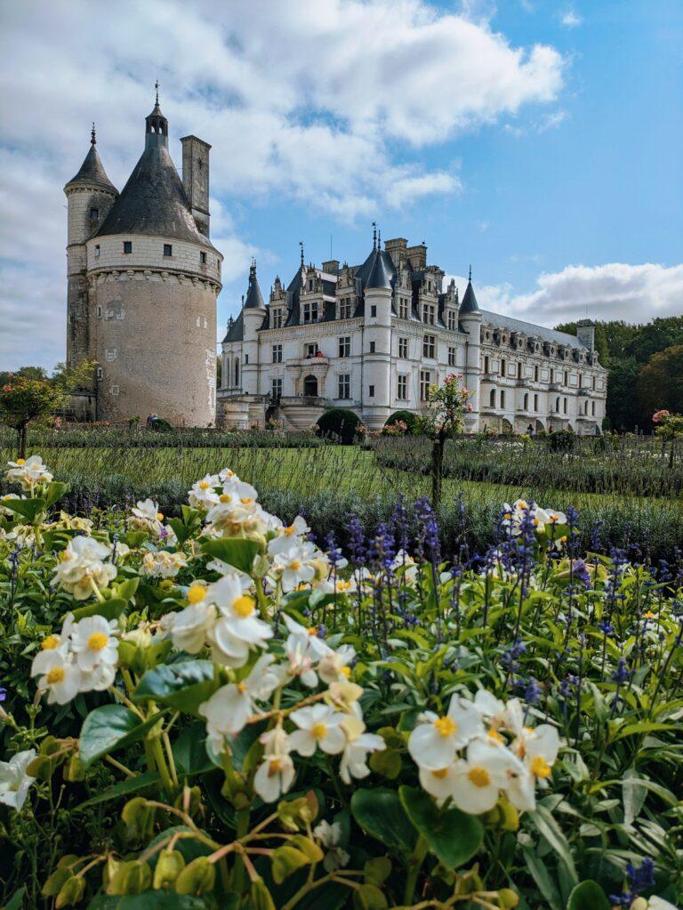 Château de Chenonceau on the River Cher Loire Valley iconic castle reflection, Aerial view of Chenonceau Castle stretching across the river Renaissance architecture, Interior of Château de Chenonceau grand gallery with arched windows, The Apothecary of Chenonceau Castle historic cabinets and jars, Chenonceau gardens in spring colorful flowers and symmetrical design, A Day at Chenonceau Castle: The Jewel of the Loire Valley, Castle façade of Chenonceau at sunrise soft golden light over the river, Château de Chenonceau during autumn warm colors surrounding the castle, Historic kitchen of Chenonceau Castle copper pots and stone arches, Visitors walking across the gallery bridge at Château de Chenonceau, Night view of Chenonceau Castle illuminated reflections on the Cher River