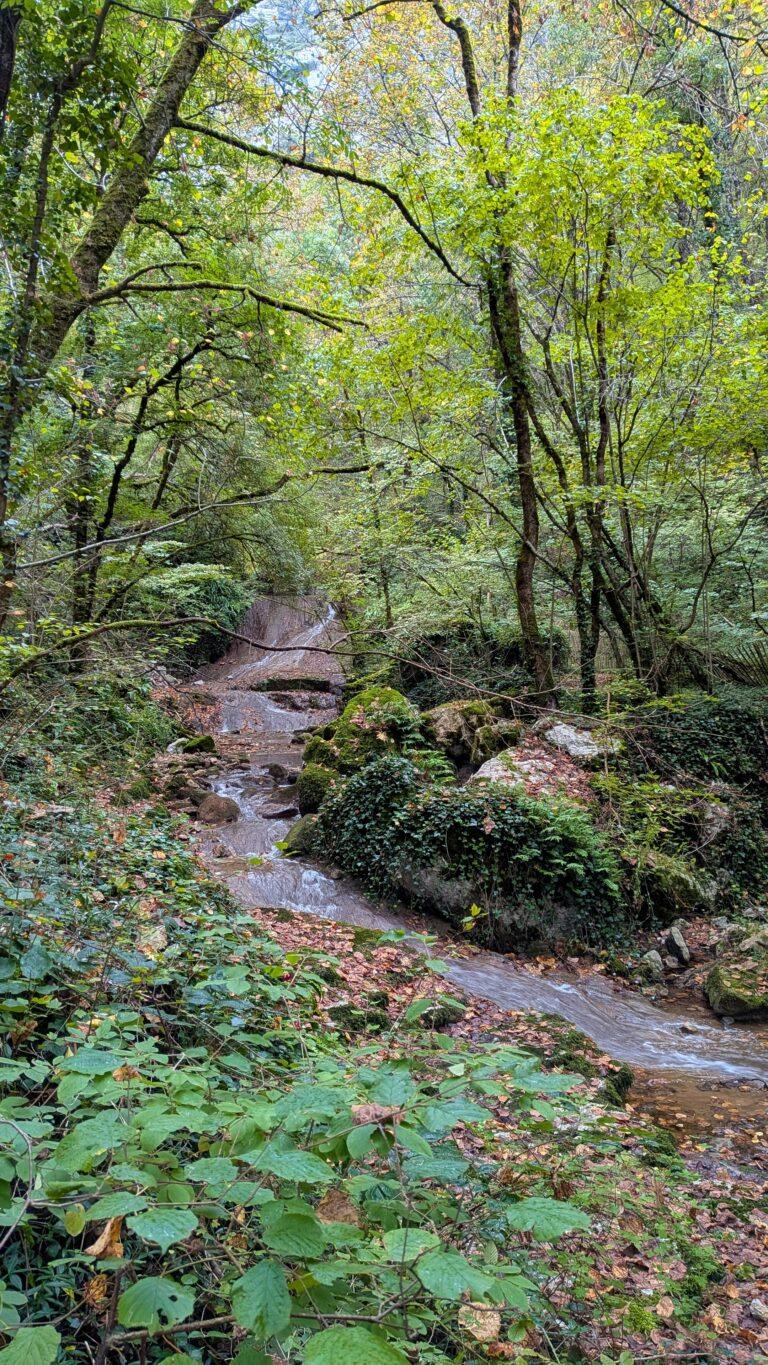 Autoire waterfall, cascade d’autoire, natural wonder, lush green landscape Autoire waterfall path, hiking trail, Lot valley, scenic nature