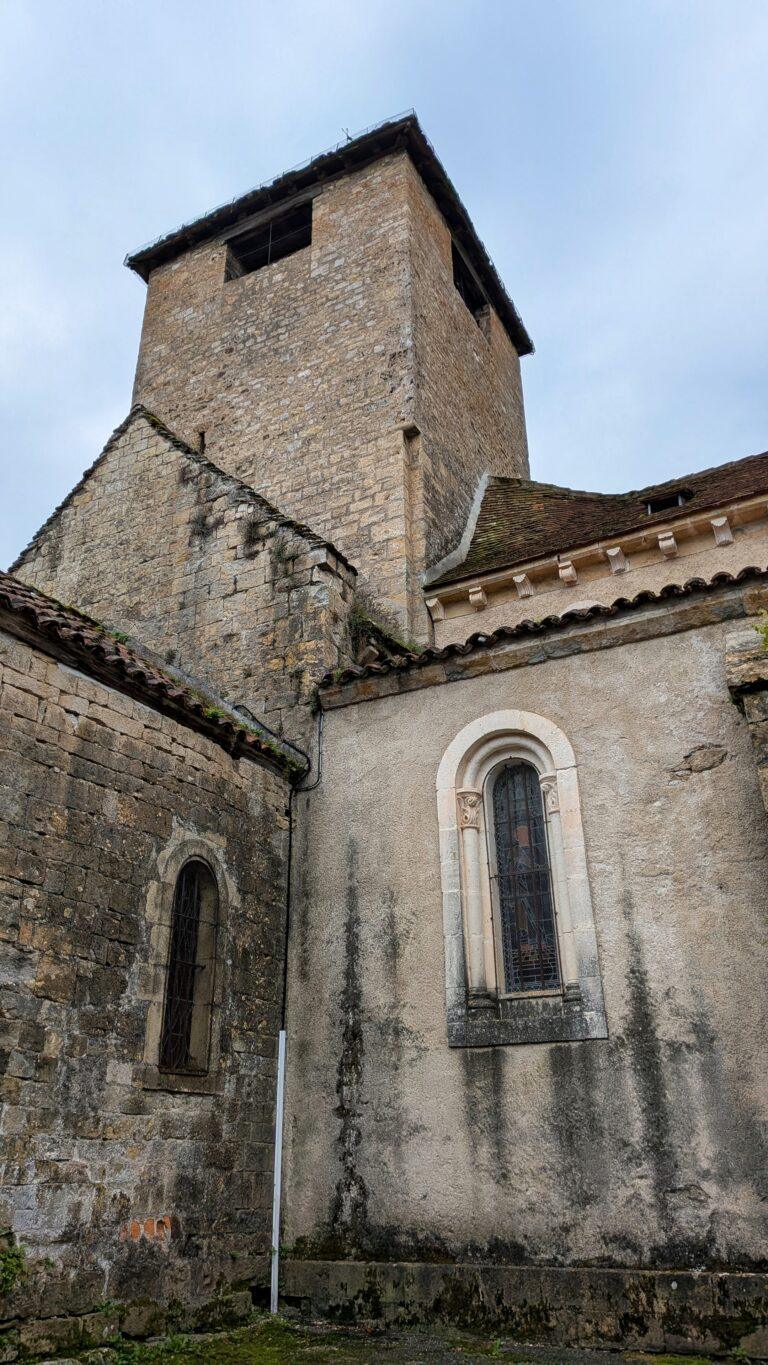 aint-Pierre church Autoire, Romanesque architecture, stone bell tower, autoire village, golden stone houses, medieval architecture, lot region, france autoire valley, limestone cliffs, picturesque landscape, south west france autoire rooftops, panoramic view, charming french village, countryside scenery, saru's postcards, French village, Autoire: The Little Versailles of the Lot